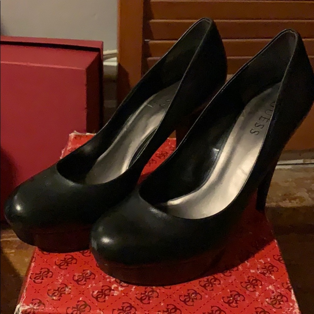 Black leather pumps